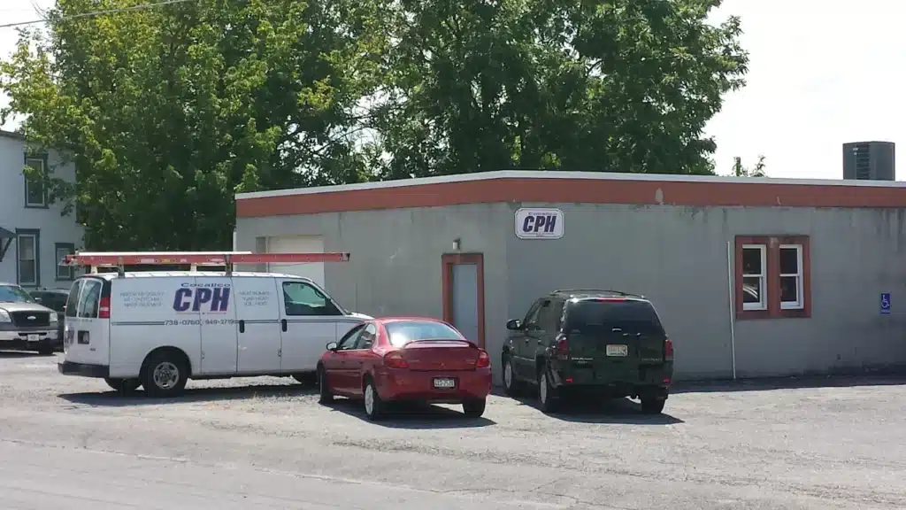 Cocalico Plumbing & Heating office building and van