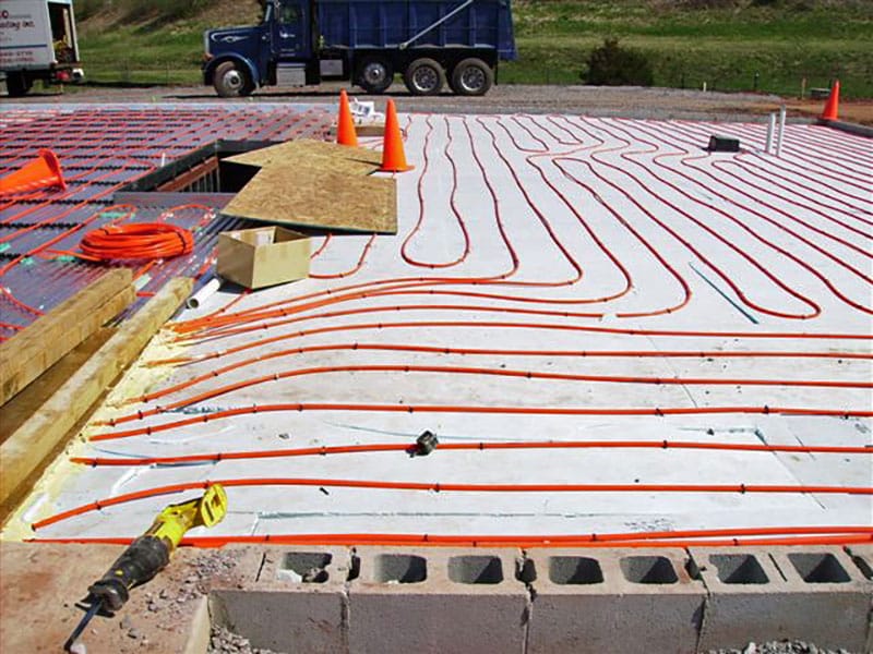 Radiant heat tubing laid out before a concrete pour