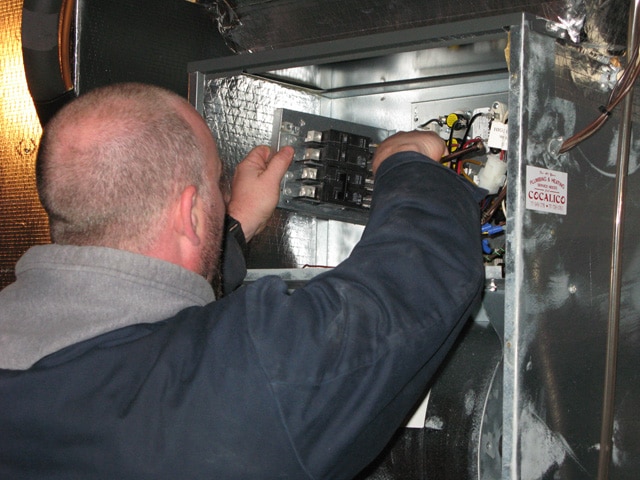 Technician installing a heating system in Wernersville, PA