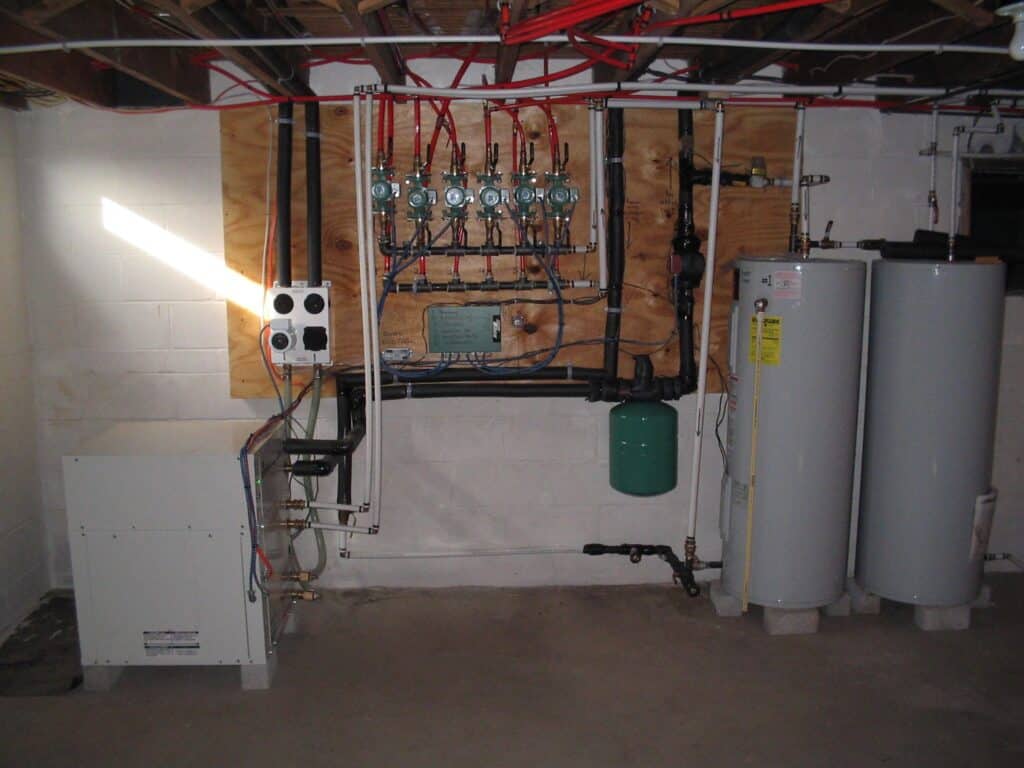 Basement mechanical room with boiler and water heaters in Sinking Spring, PA